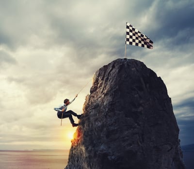 Businessman try to reach the goal. Difficult career concept photo