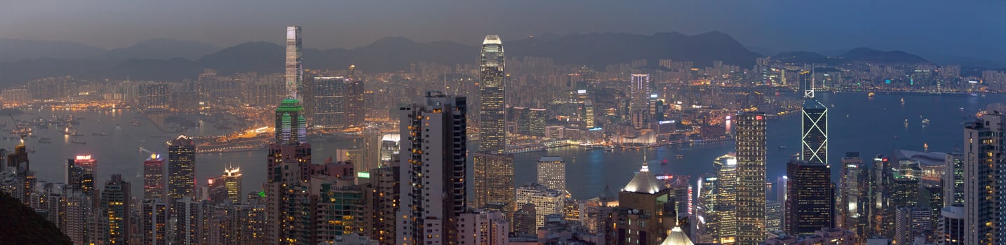 Panoramic view of Kowloon and Victoria Harbour in Hong Kong photo