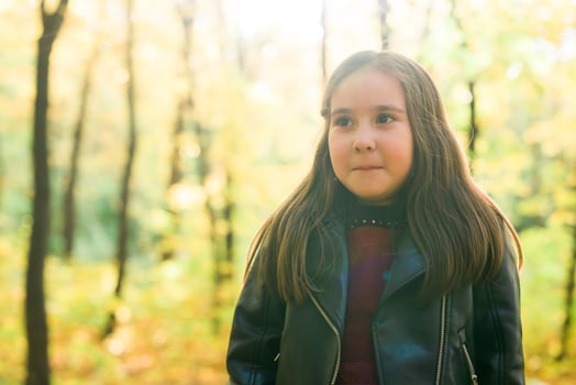 Autumn portrait of cute little asian girl. Children, fall and season concept. photo