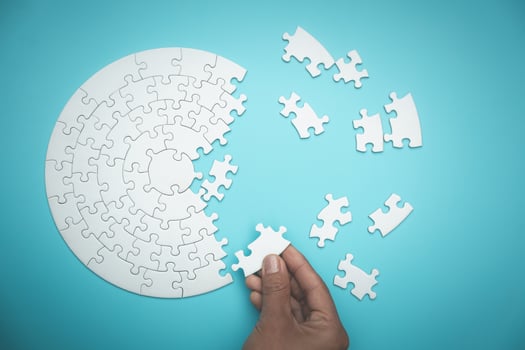 Pieces of jigsaw puzzle in man's hands, Business solutions, success and strategy concept. photo