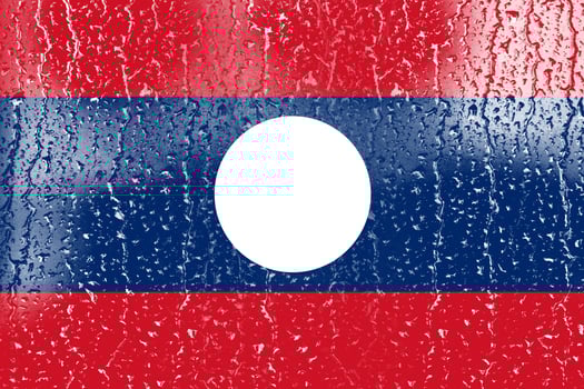 3D Flag of Laos on a glass photo
