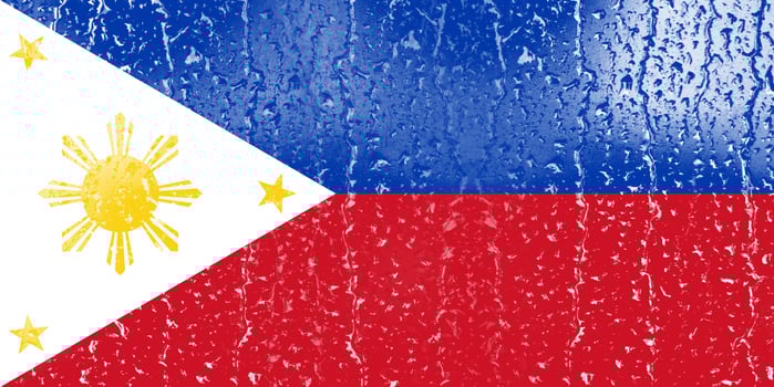 3D Flag of Philippines on a glass with water drop background. photo