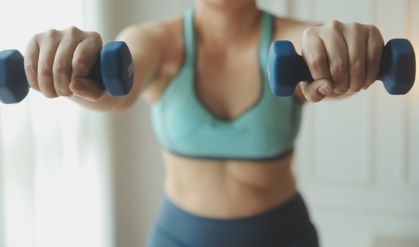 Woman exercise workout in gym fitness breaking relax holding apple fruit after training sport with dumbbell and protein shake bottle healthy lifestyle bodybuilding, Athlete builder muscles lifestyle. photo