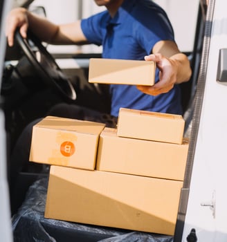Starting small businesses SME owners man entrepreneurs working, box and check online orders to prepare to pack the boxes, sell to customers, sme business ideas online. photo