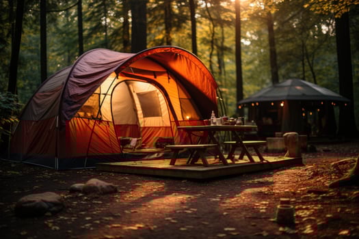 Camping picnic tent campground in outdoor hiking forest. photo