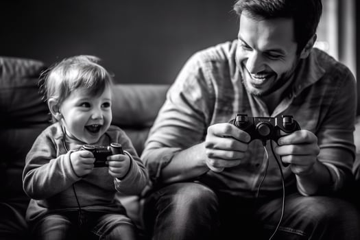 cheerful father and son playing game at home photo