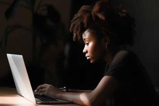 black girl working on a laptop. art photo