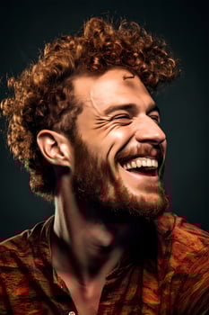 Cheerful studio Portrait of a smiling European man with curly red hair, close-up, soft light, art photo