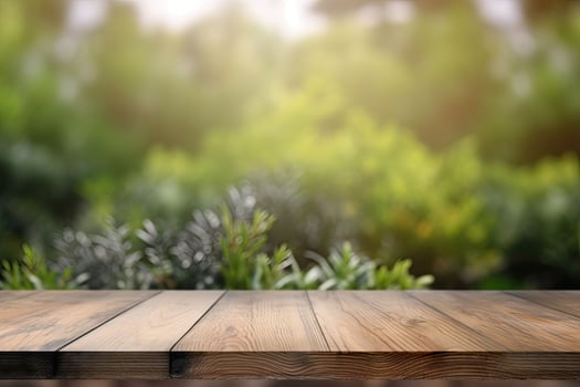 Image of wooden table in front of abstract blurred background made of plants. photo