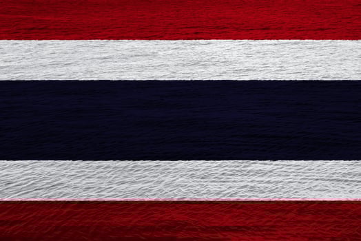 Flag of the Kingdom of Thailand on a textured background. Concept collage. photo