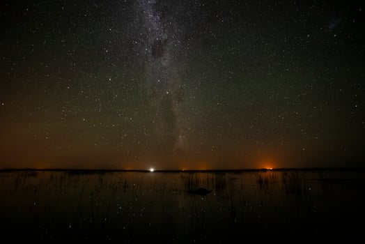 Starry sky reflected in the water, La Pampa Province, Patagonia, Argentina. photo