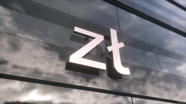 Polish zloty symbol currency sign on a modern glass skyscraper. Business and finance concept. 3d illustration photo