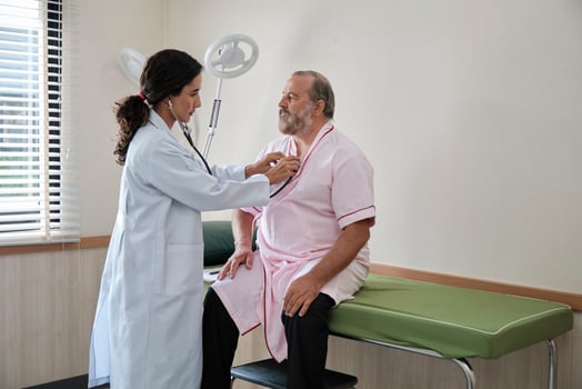 Female doctors in uniform healthy check White male patients in examination coat by stethoscope, and checkups and advise health care diagnosis at clinic hospital, and appointments visit. photo