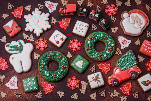 Beautiful delicious Christmas gingerbread on a concrete texture background photo