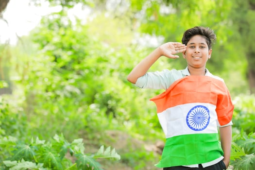 Indian boy holding national flag in farm, happy boy, national flag photo