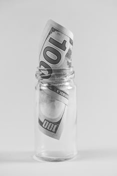 Banknote in a jar photo
