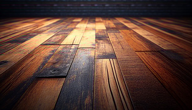 A wooden floor with a dark background and a light shining on it, photo