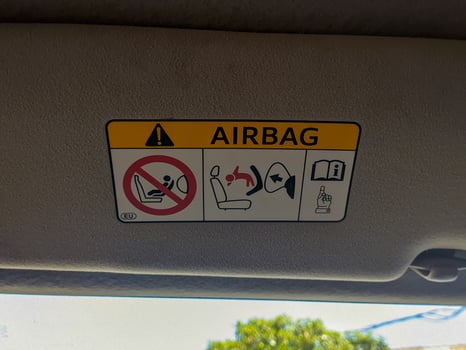airbag warning instruction symbol in car photo