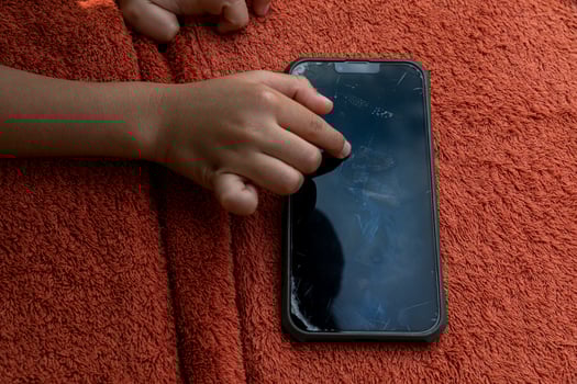 Broken phone whit the  background photo