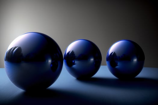 Three Shiny Blue Balls On A Blue Surface. photo