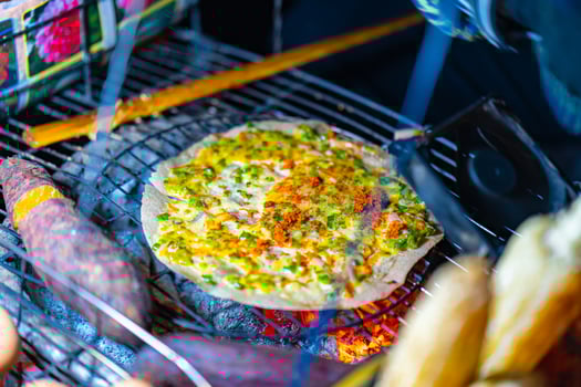 Close up of Banh Trang Nuong Or local vietnam pizza is a popular street food for tourist and people in Da Lat, Vietnam photo