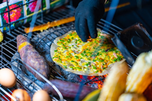 Close up of Banh Trang Nuong Or local vietnam pizza is a popular street food for tourist and people in Da Lat, Vietnam photo