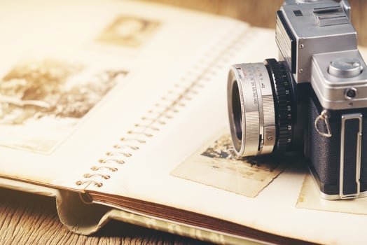 retro camera on the background of old photos
