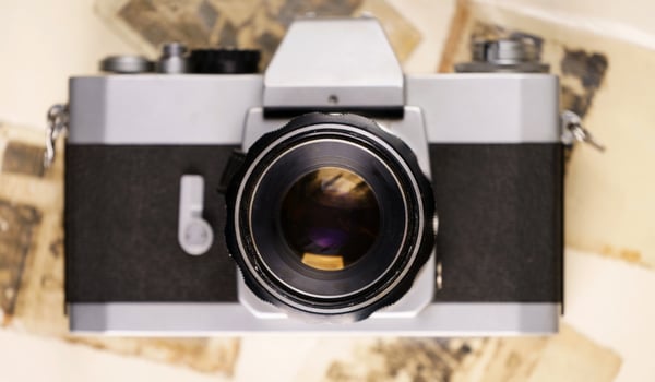 retro camera on the background of old photos