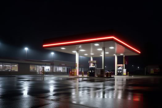 Gas station at night. Refueling of gasoline at gas station photo
