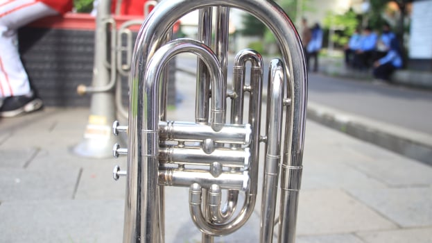 Close up on a valve section of a professional trumpet photo