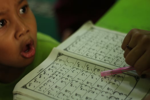 Magelang, Indonesia.07.10.2023-An Islamic Children Learning Islamic Knowledge Mengaji In The Mosque. photo
