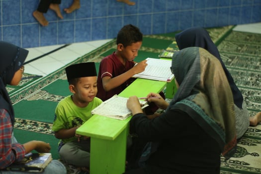 Magelang, Indonesia.07.10.2023-An Islamic Children Learning Islamic Knowledge Mengaji In The Mosque. photo