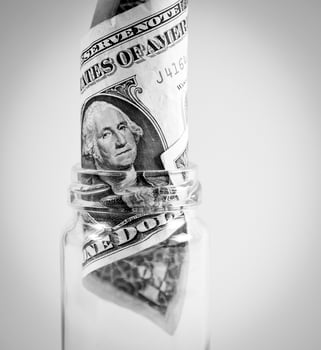 Banknote in a jar photo