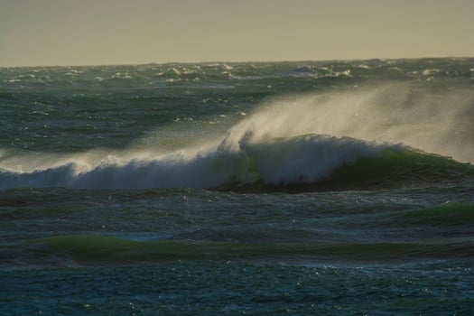 Waves with strong wind after a storm, Patagonia, Argentina. photo