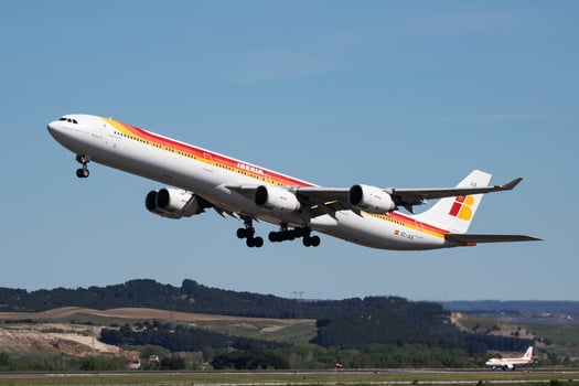 Iberia Airlines passenger plane at airport. Schedule flight travel. Aviation and aircraft. Air transport. Global international transportation. Fly and flying. photo