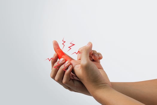 A male patient suffering from joint, finger pain and numbness, depicting a medical symptom, against a white background. photo