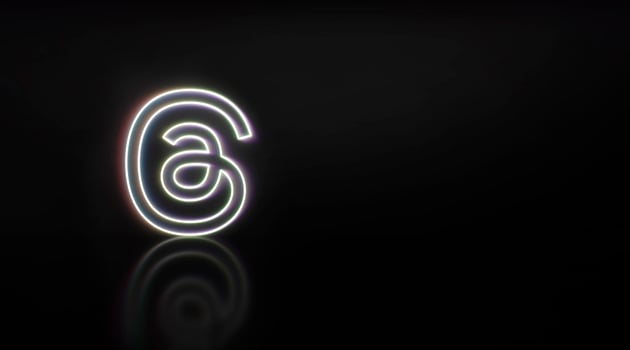 Madrid, Spain - July, 2023. Threads logo in neon with space for text and graphics. photo