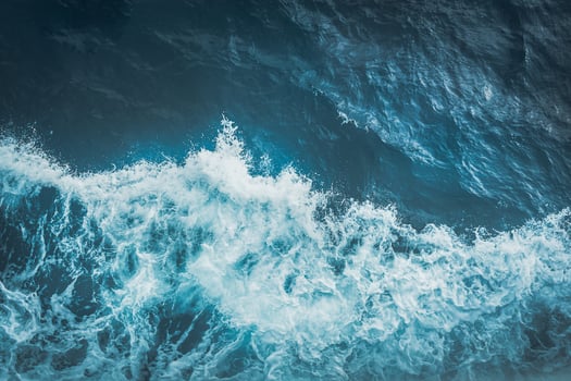 View from above turquoise ocean waves background. photo