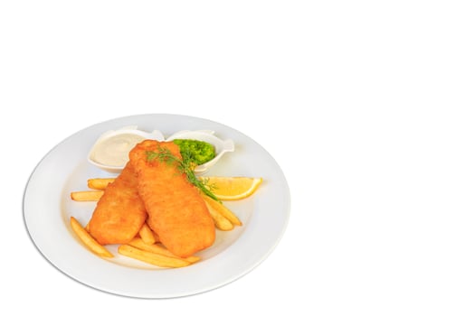 Traditional British Fish and Chips with french fries and tartar sauce photo