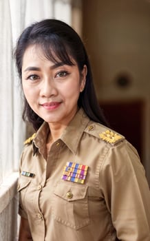 photo of middle aged asian woman in Thai teacher uniform,