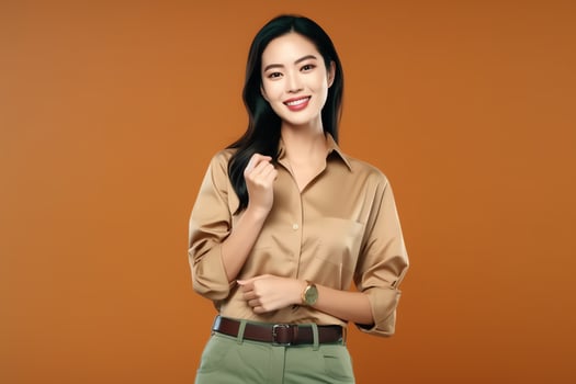 Beautiful asian woman in casual with smile cheerful. Studio shot asian woman standing hand gesture concept by photo
