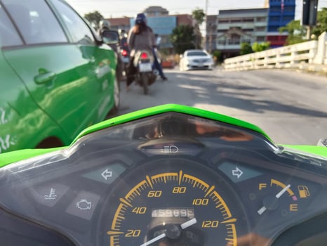 Driving a motorcycle during traffic jams photo