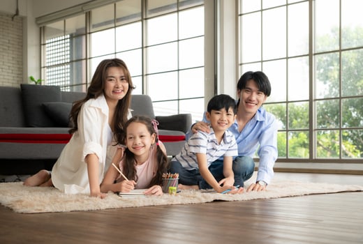 A boy and a daughter from an asian family. The children are having fun in the art of drawing. photo