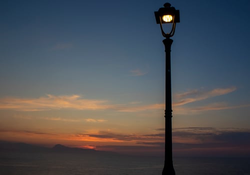 Lantern Streetlight and Beautiful Sunset. Lantern with Burning Light at Sunset photo