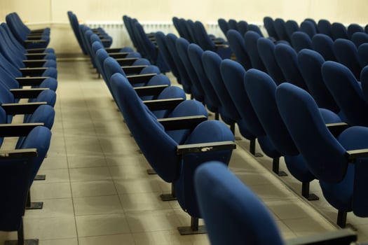 Blue seats in hall. Chairs in cinema. Place to watch movie. photo