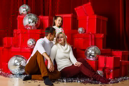 Portrait of friendly family on Christmas evening photo