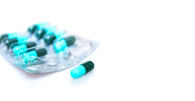 Medicine capsule panel on white background photo