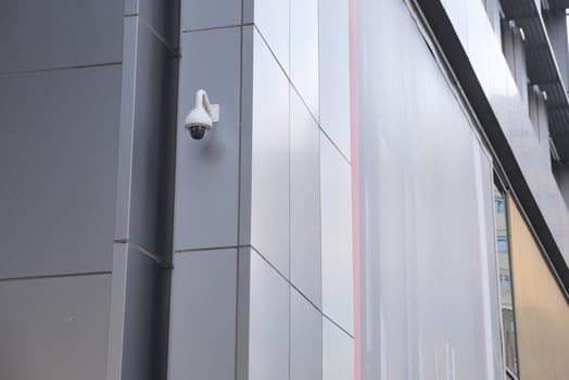 CCTV security camera operating outdoor photo