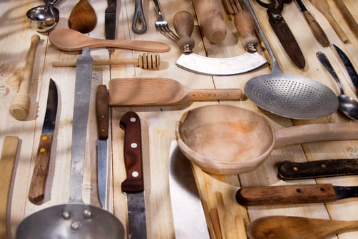 a bunch of different utensils on a table photo