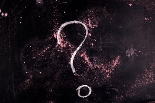 a question mark is drawn on a blackboard photo